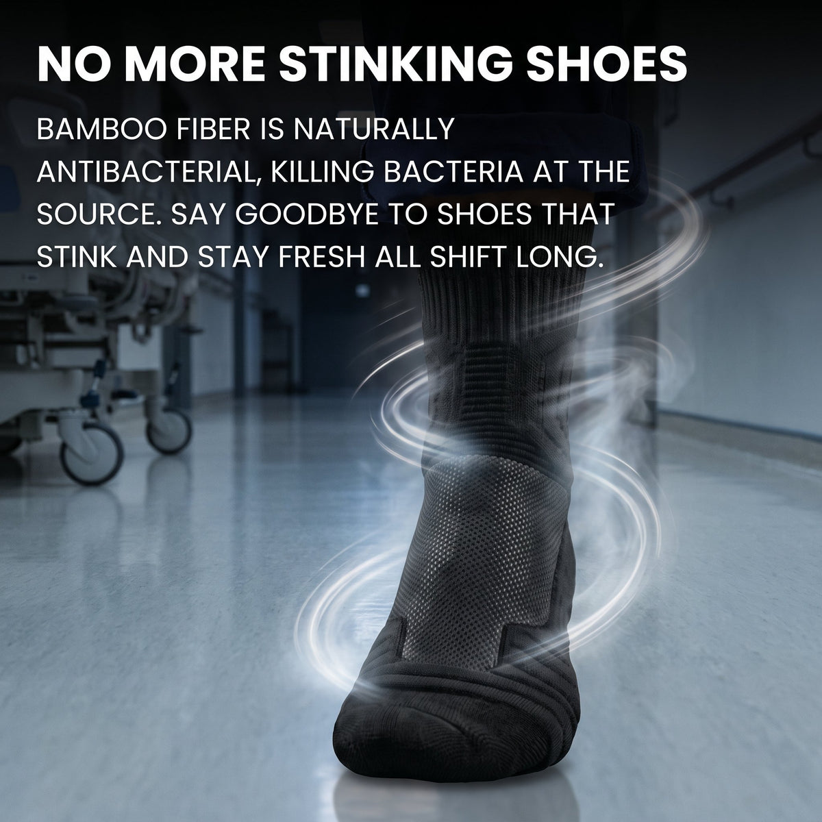 Foot in a black bamboo Shift Sock surrounded by swirls of fresh air in a hospital corridor.