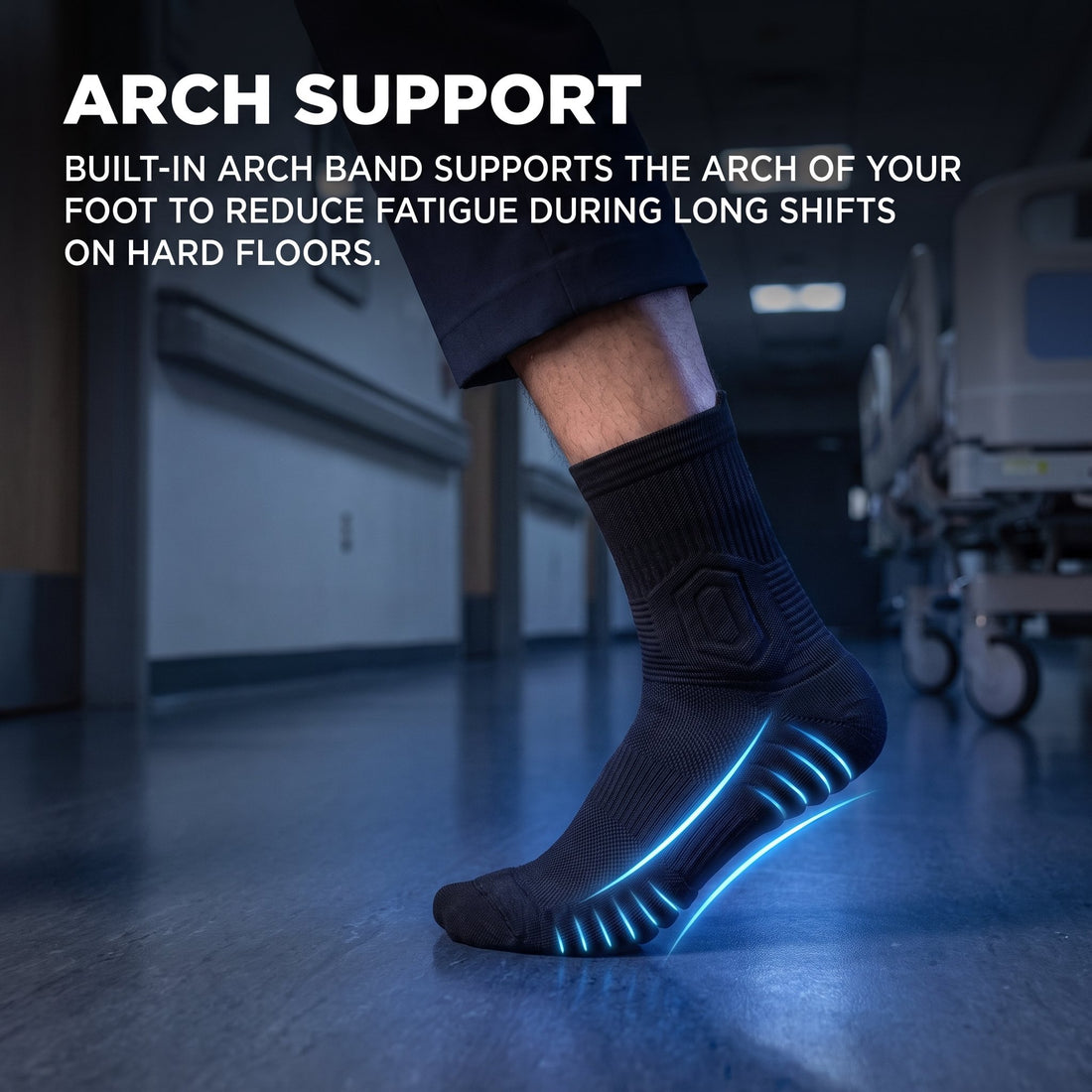 Side view of a black Shift Sock with the arch support band highlighted in blue, in a hospital corridor.